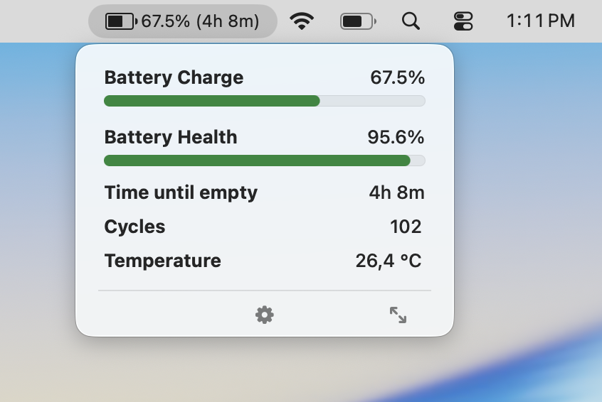 coconutBattery Plus menu bar popover showing charge, health, time until empty, cycles, and temperature.